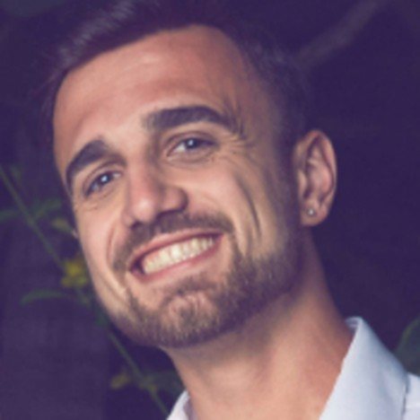 Headshot of Cole Caminiti, founder of F8 Enterprises, smiling